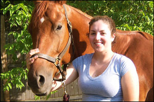 sorrel horse with woman