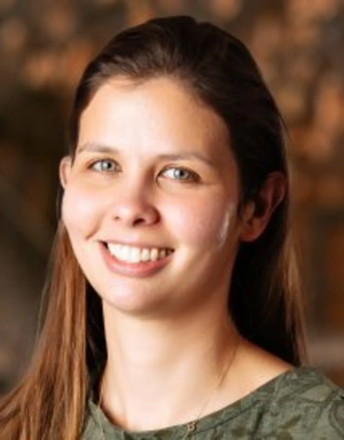 Dr. Jessica Hanson in front of nature Dr. Jessica Hanson in front of nature