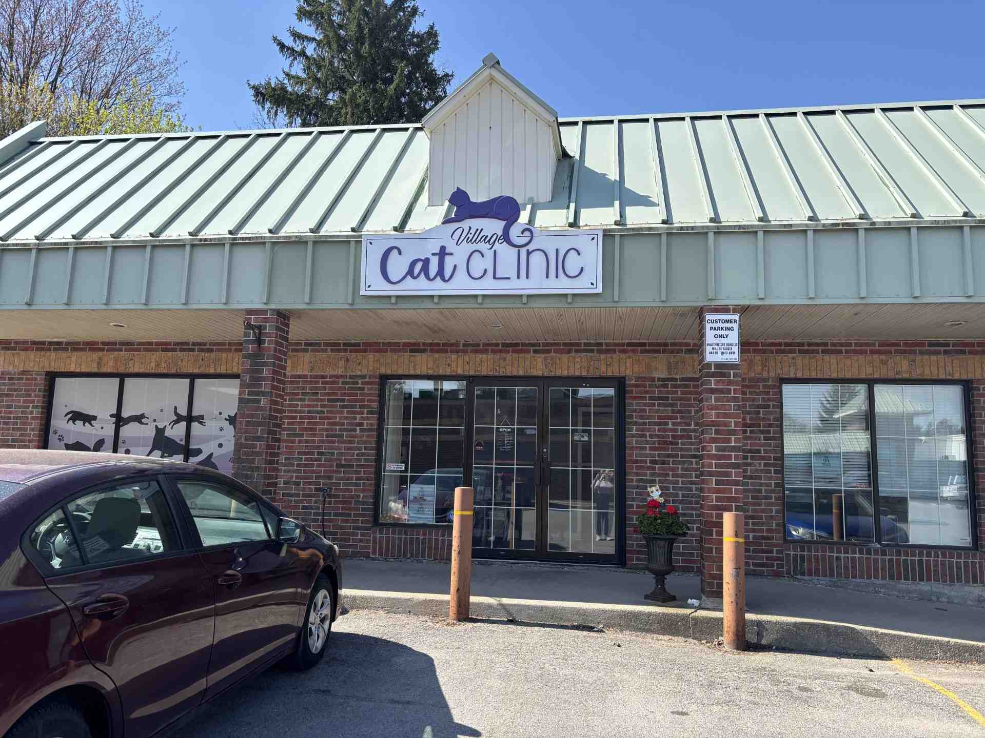 Exterior view of the Village Cat Clinic's building.