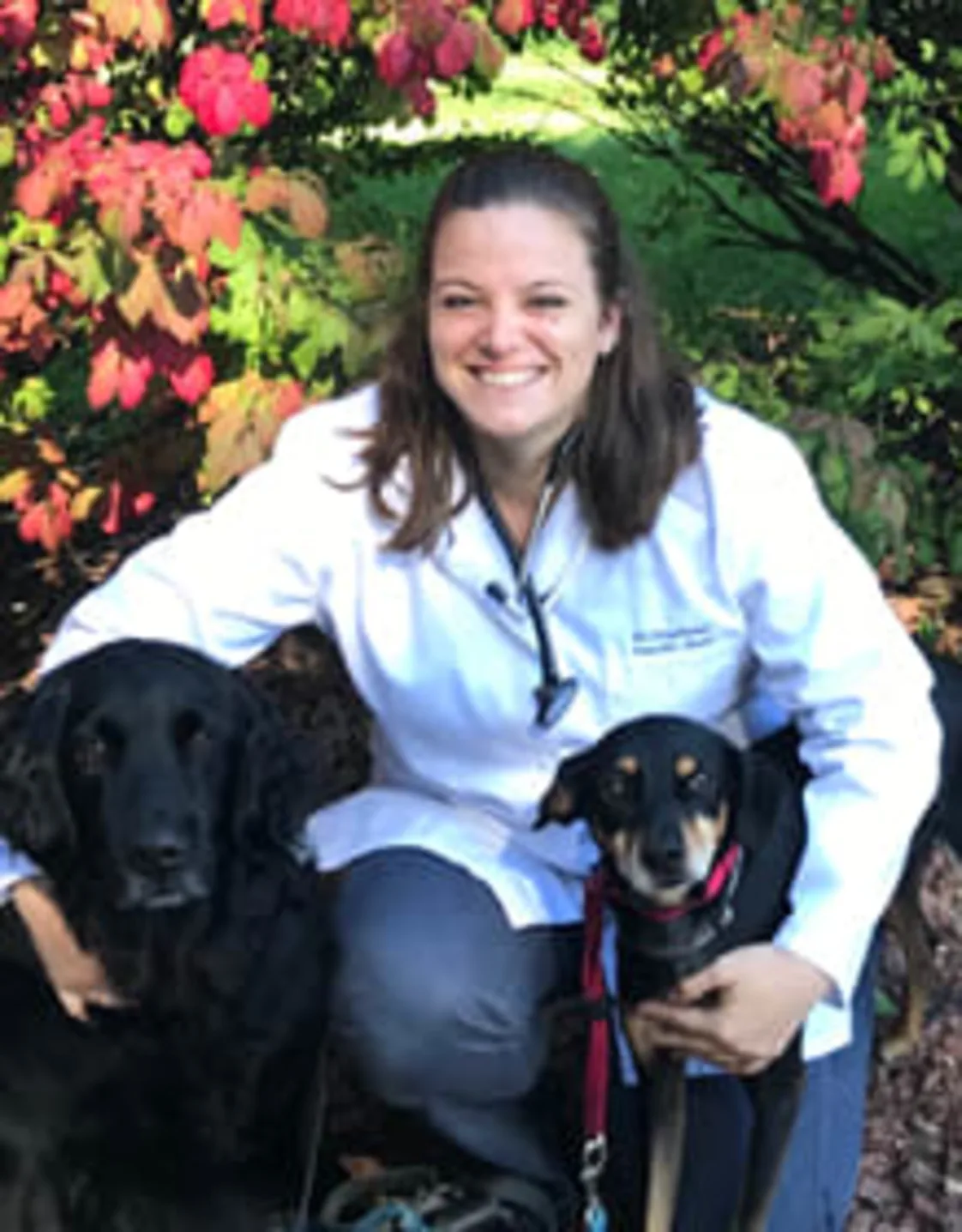 Stephanie Vanden Bush with two black dogs Stephanie Vanden Bush with two black dogs