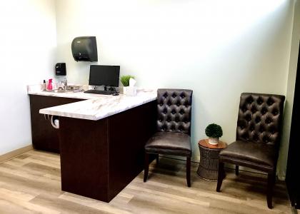 Consultation Room at Desert Hills Animal Hospital with exam table and seating