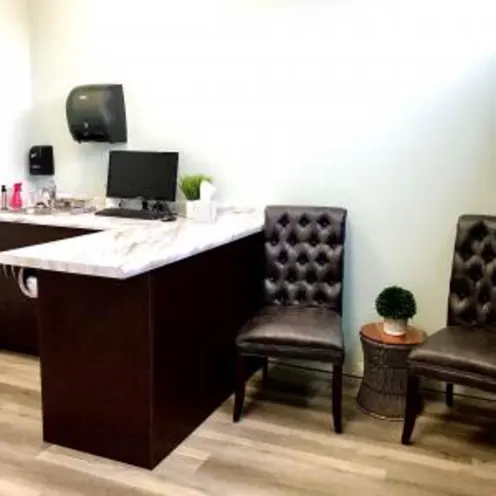 Consultation Room at Desert Hills Animal Hospital with exam table and seating