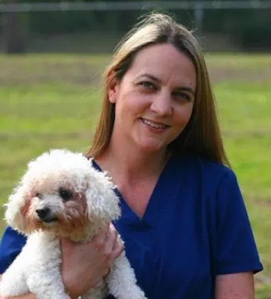 Kathleen C. with dog staff photo