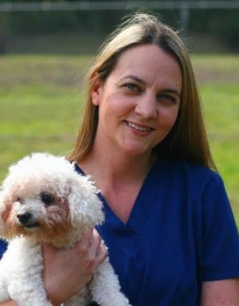 Kathleen C. with dog staff photo