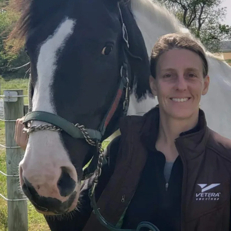 Michelle Egli with a brown and white horse Michelle Egli with a brown and white horse