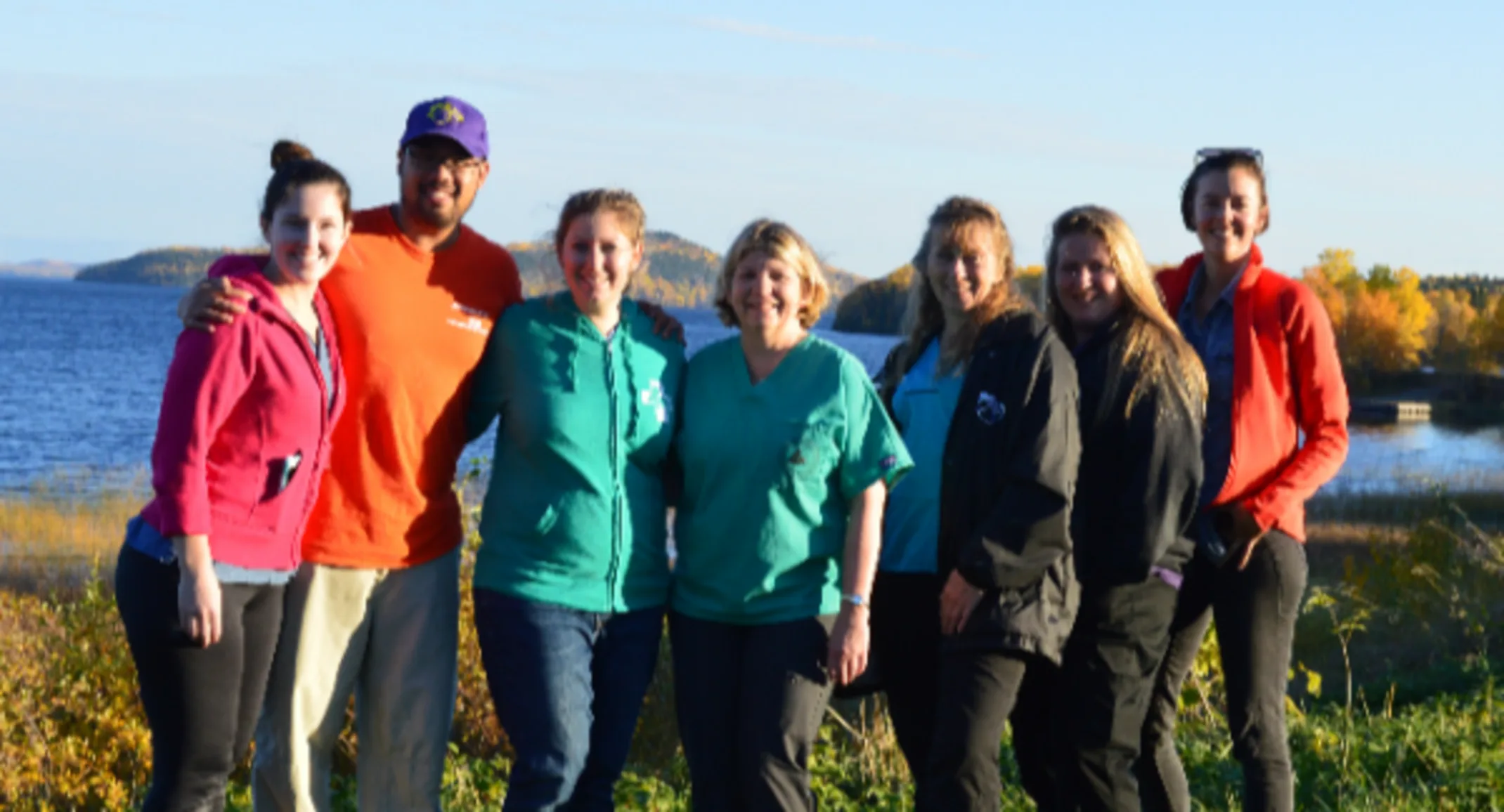A group of Allandale's staff posing by sachigo lake A group of Allandale's staff posing by sachigo lake