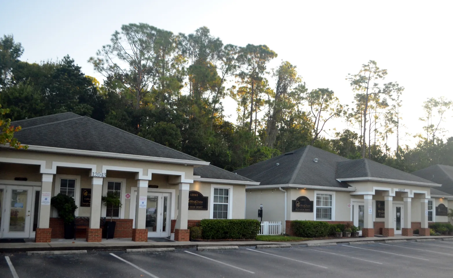 An image of both buildings for Westchase Veterinary Center & Emergency An image of both buildings for Westchase Veterinary Center & Emergency