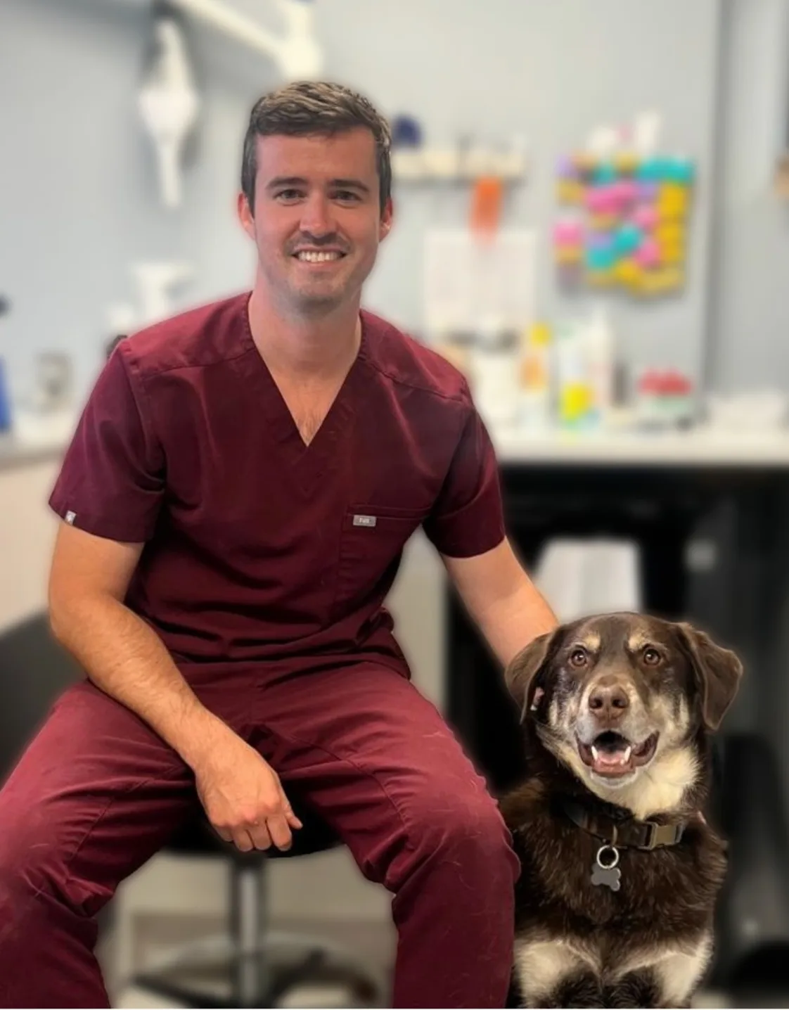 Dr. Daniel Martin and a dog Dr. Daniel Martin and a dog
