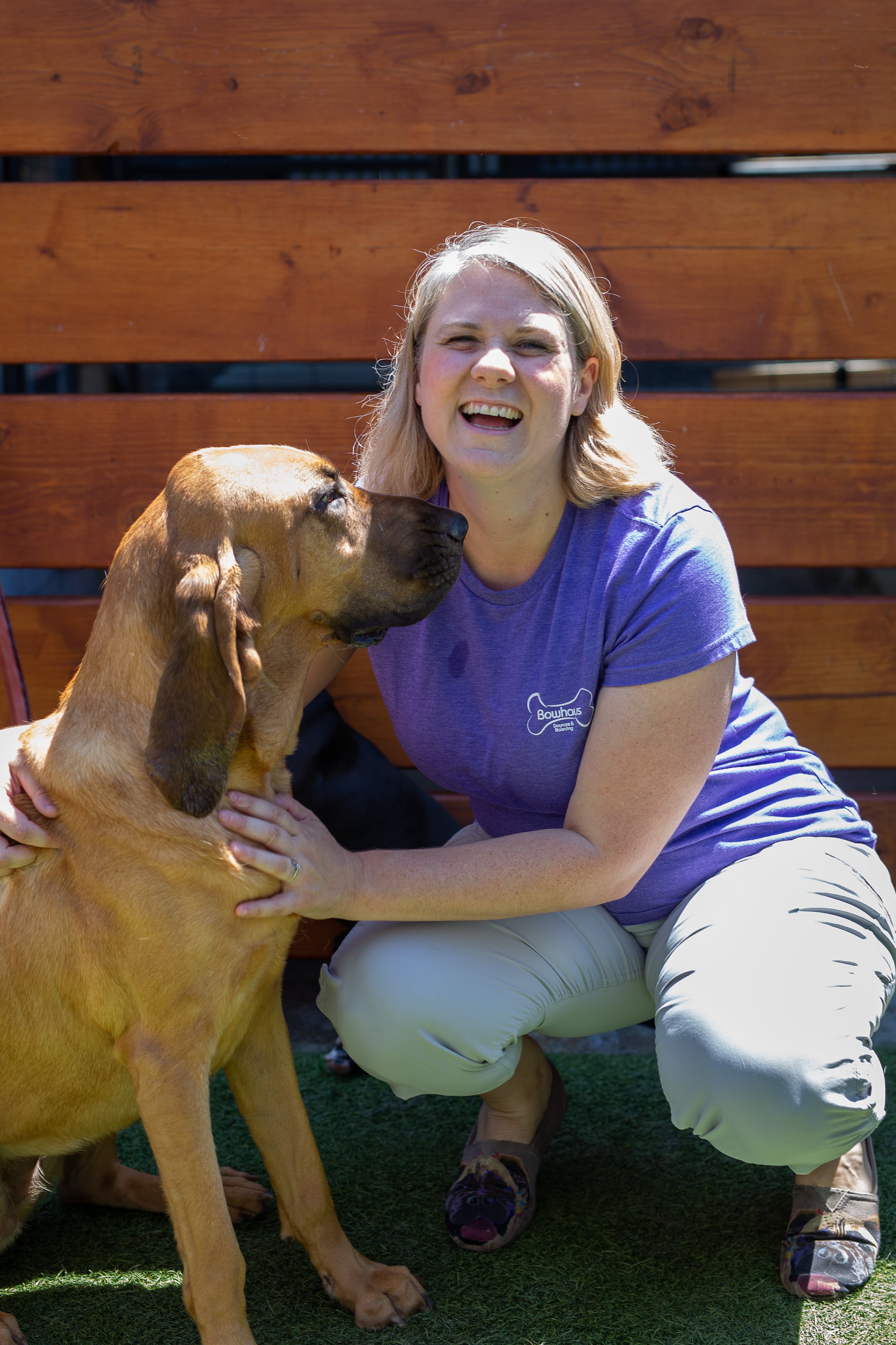 Staff with dog at Bowhaus in Boulder, CO