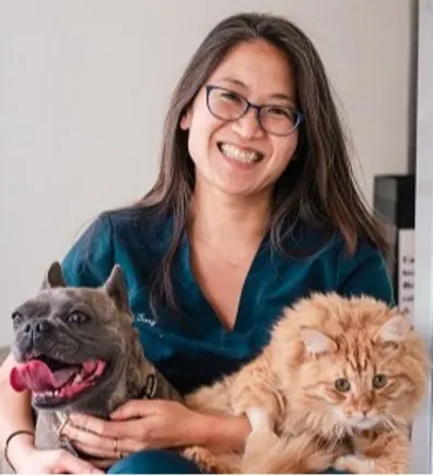 Terry Li with cat at Battery Park Veterinary Hospital Terry Li with cat at Battery Park Veterinary Hospital
