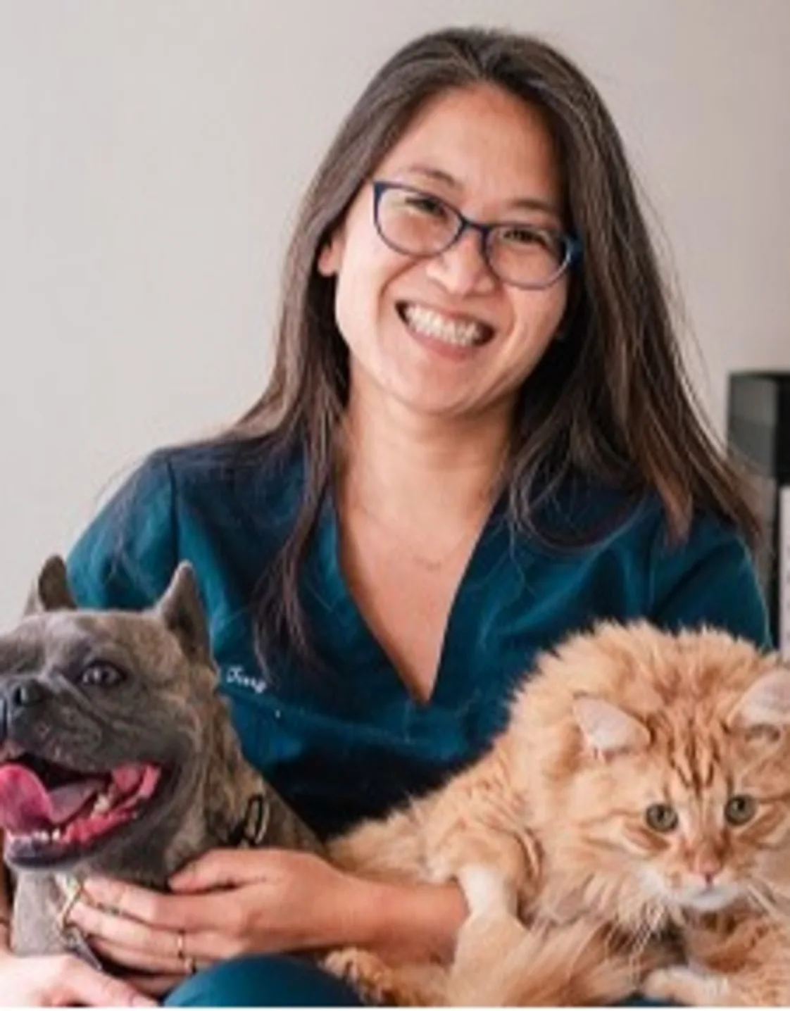 Terry Li with cat at Battery Park Veterinary Hospital Terry Li with cat at Battery Park Veterinary Hospital
