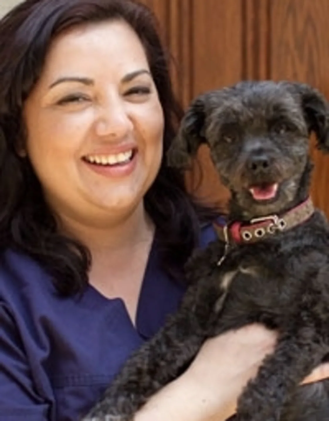 Andria holding a Black Dog Andria holding a Black Dog