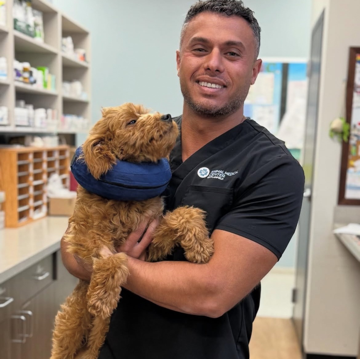 Dr. John Michael with dog on left