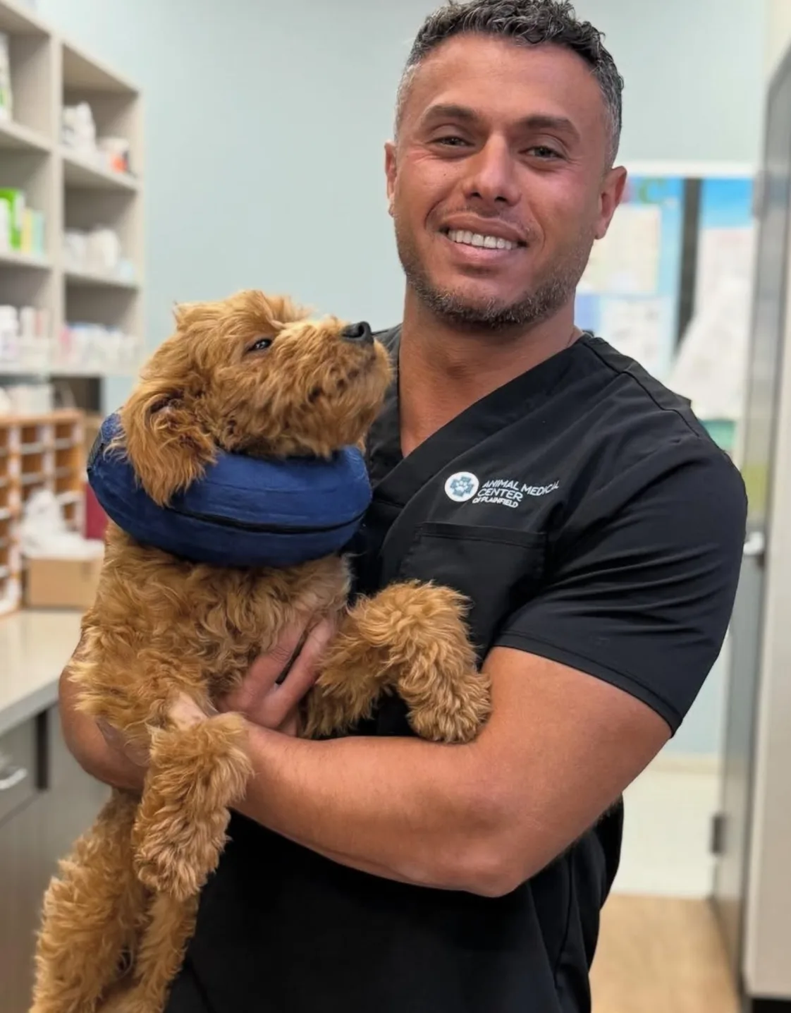 Dr. John Michael with dog on left Dr. John Michael with dog on left