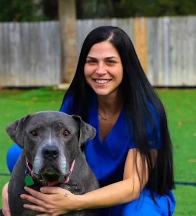 Landis hugging a dog Landis hugging a dog