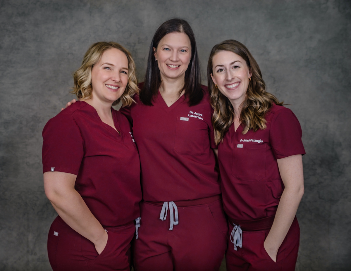 Three employees of Cassells Animal Hospital.