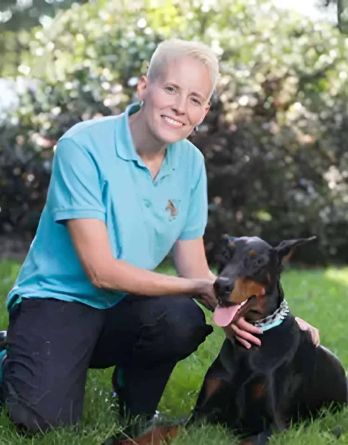 Britta Chavez and doberman Britta Chavez and doberman