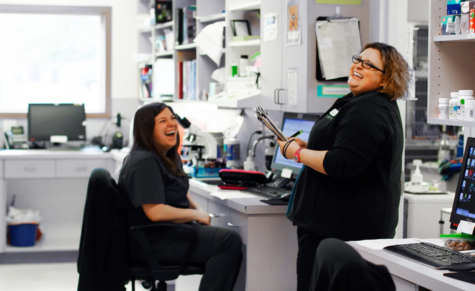 Staff Smiling in Lab Staff Smiling in Lab