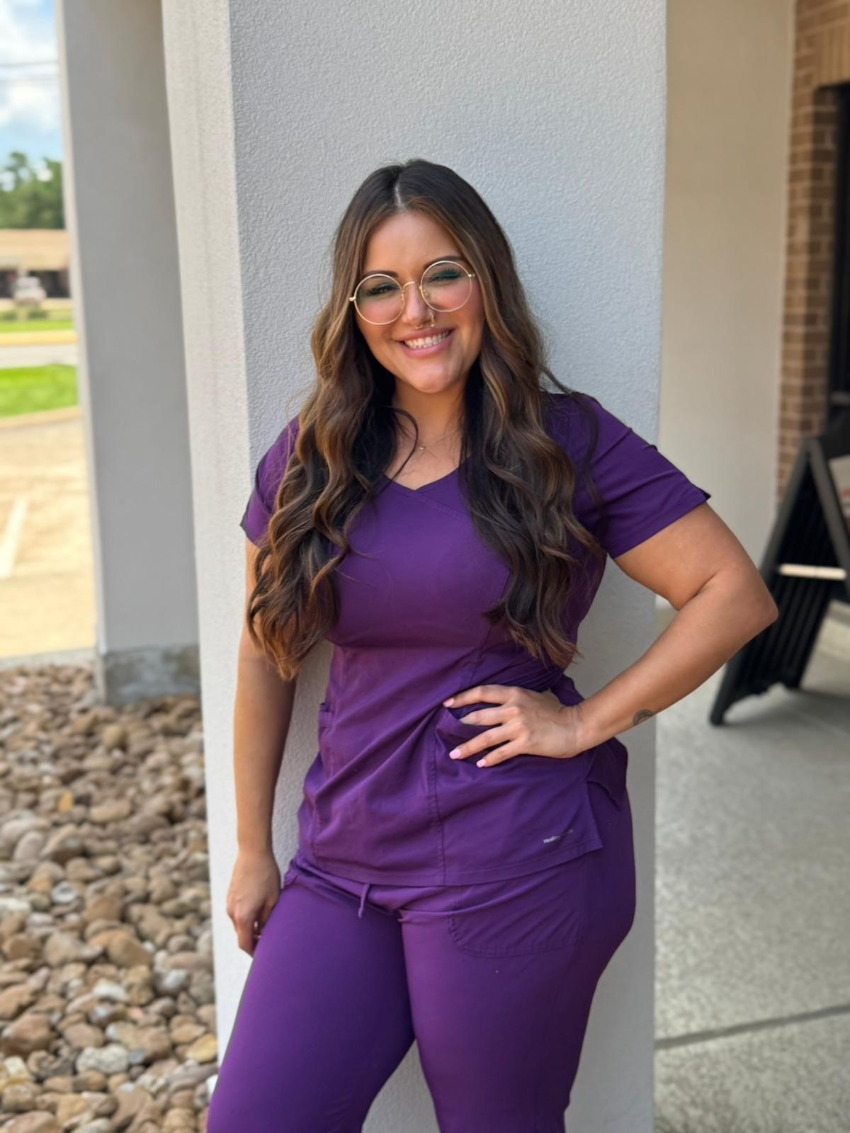 Elsa Carcamo holding two dogs
