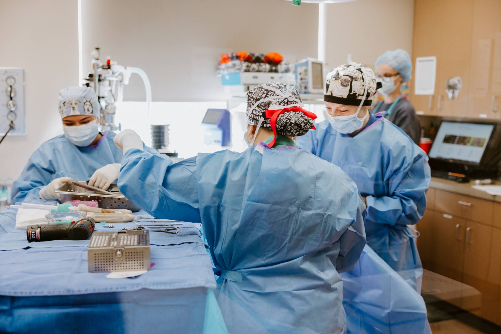 Surgeons preparing tools for an operation. 
