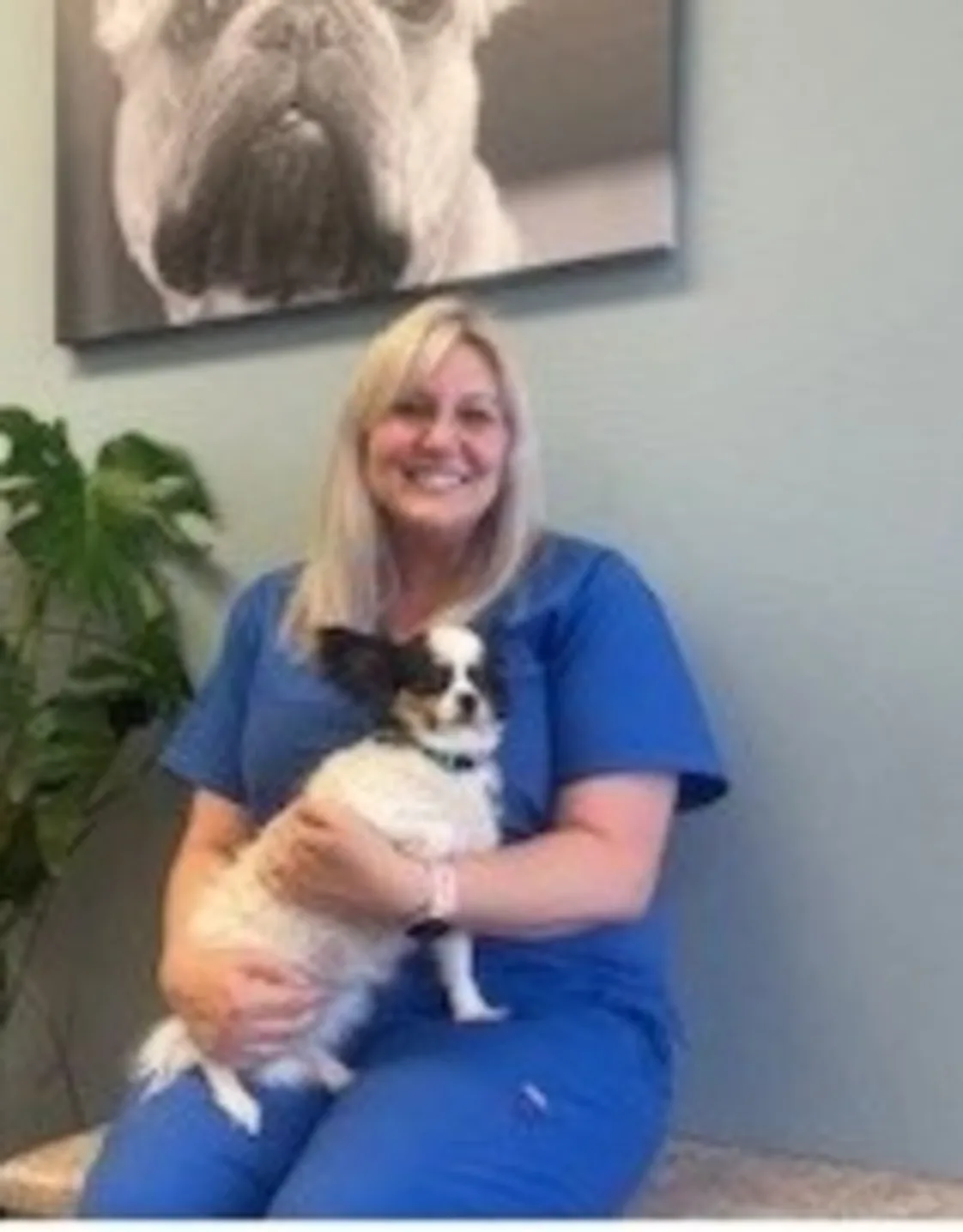 Jessica with black dog at Stonecrest Animal Hospital Jessica with black dog at Stonecrest Animal Hospital