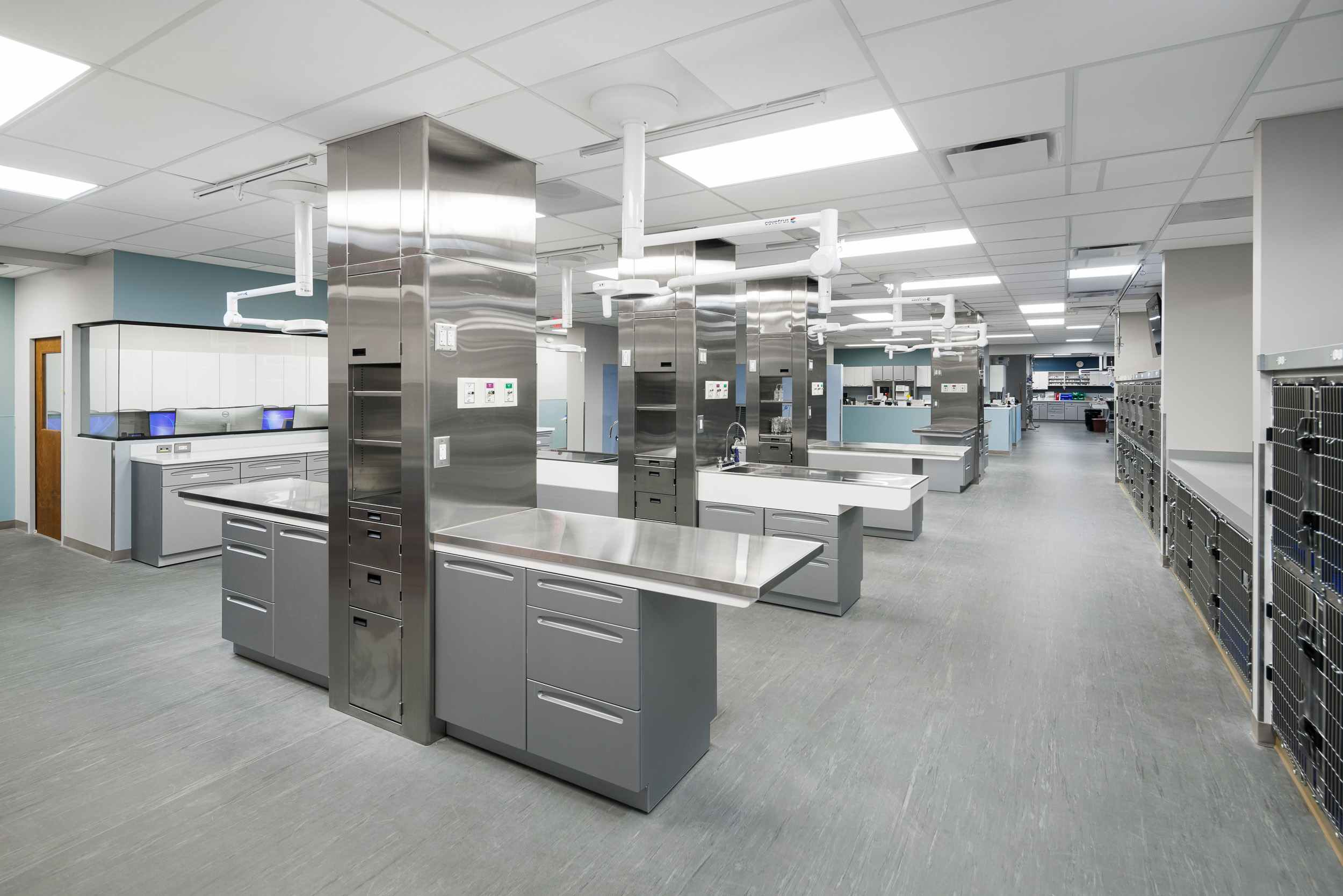 Lines of operating tables in a backroom.