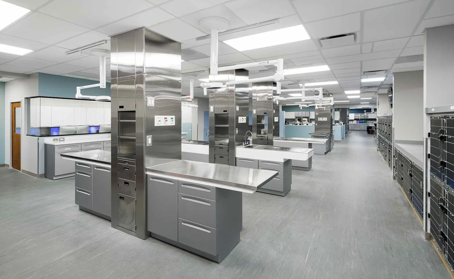 Lines of operating tables in a backroom. Lines of operating tables in a backroom.