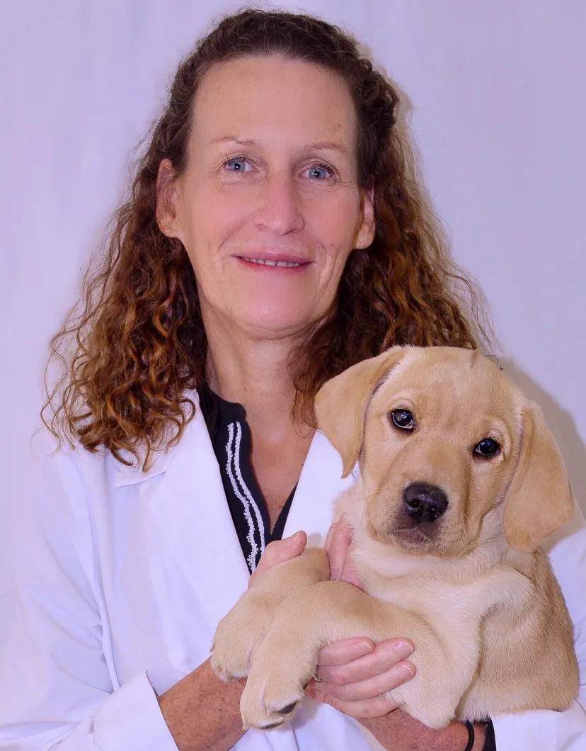 Dr. Leslie Moore with puppy at Clocktower Animal Hospital