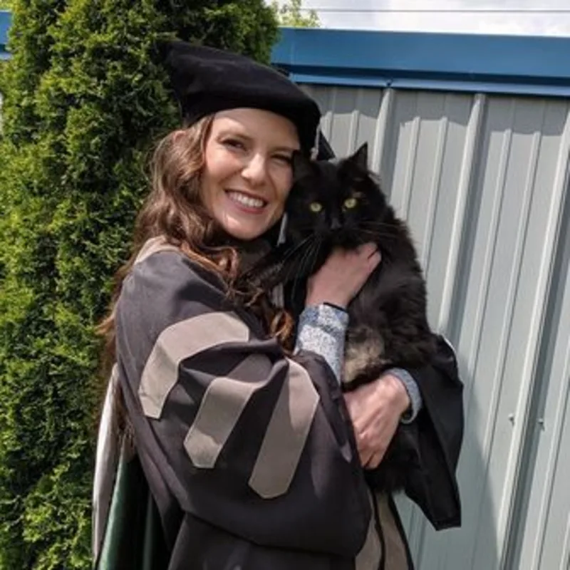 Photo of Elizabeth Durall and a black cat Photo of Elizabeth Durall and a black cat