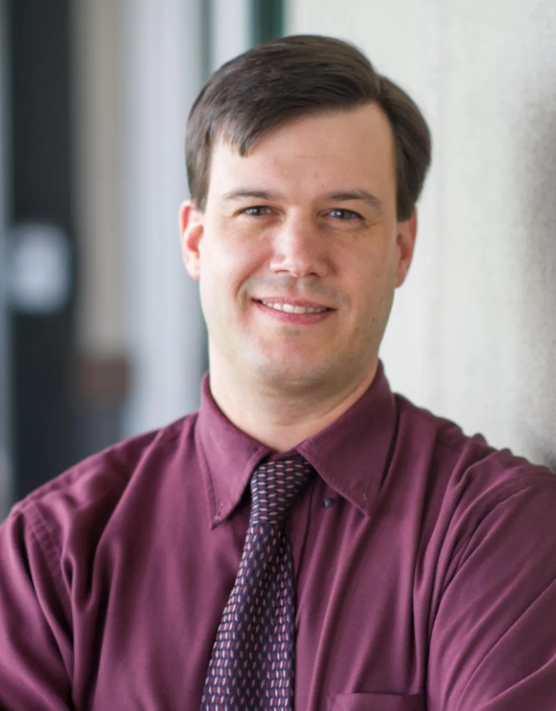 Matt Uzzle with a lab coat on. Matt Uzzle with a lab coat on.