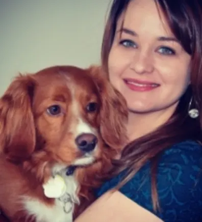 Amanda Holding a Brown Dog Amanda Holding a Brown Dog