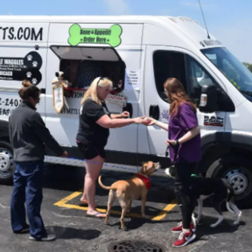 Staff Members at a Wiggle Waggles Event Staff Members at a Wiggle Waggles Event