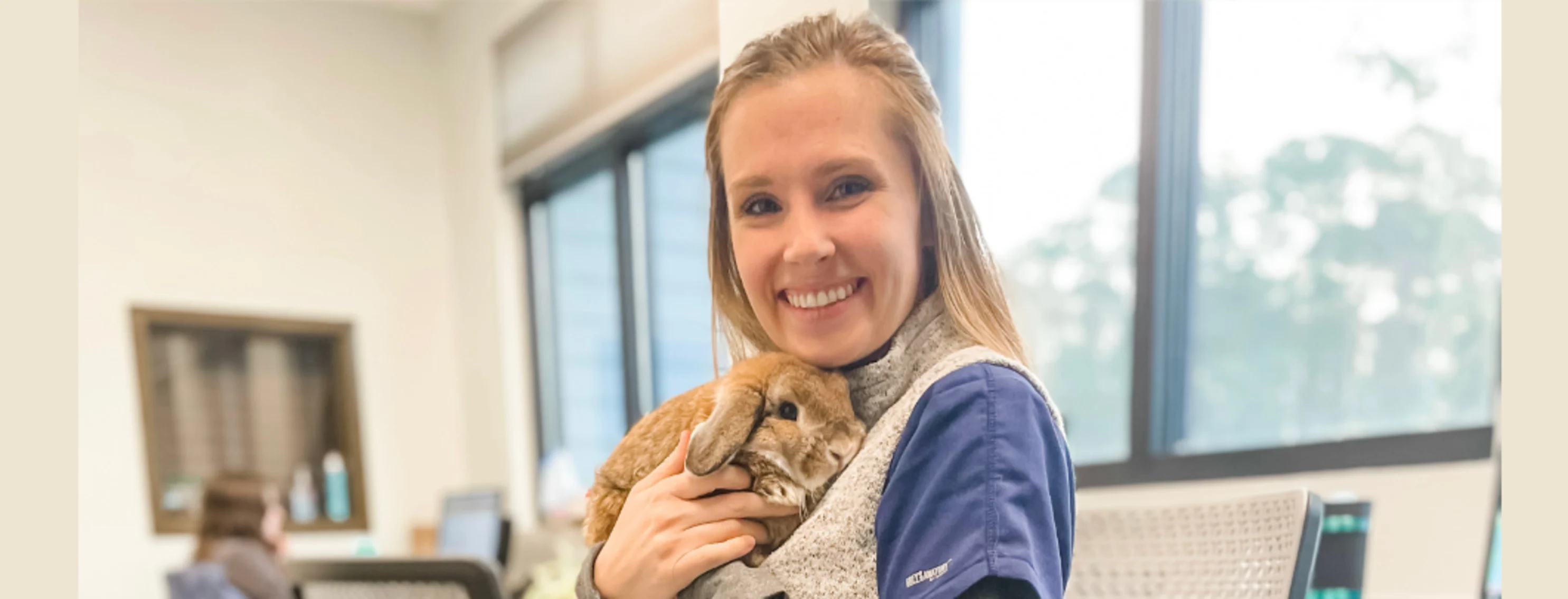 Park west vet staff holding a bunny Park west vet staff holding a bunny