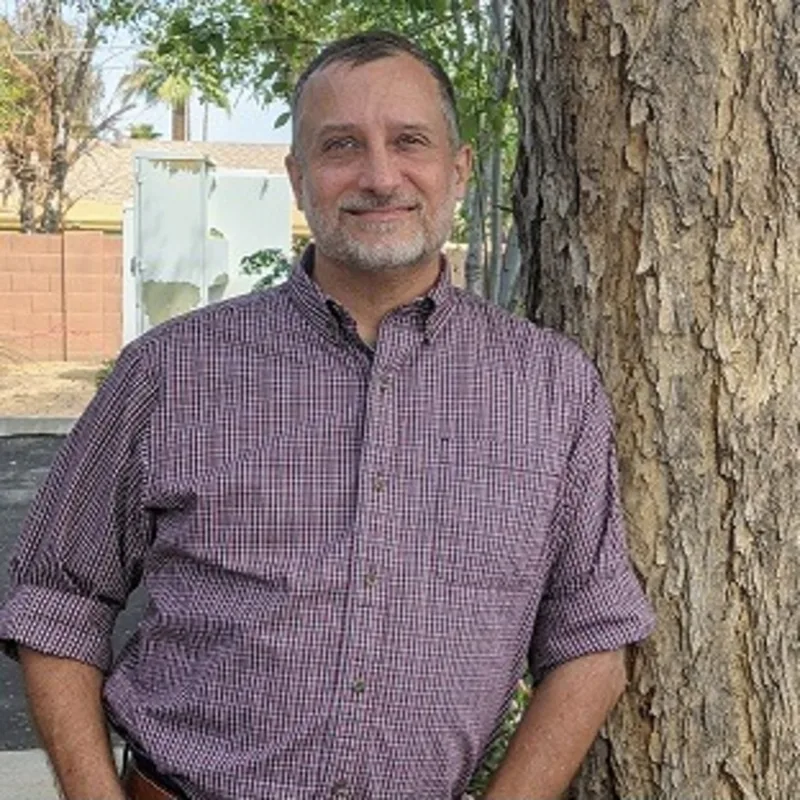 Dr. Bernard Mangone Dr. Bernard Mangone