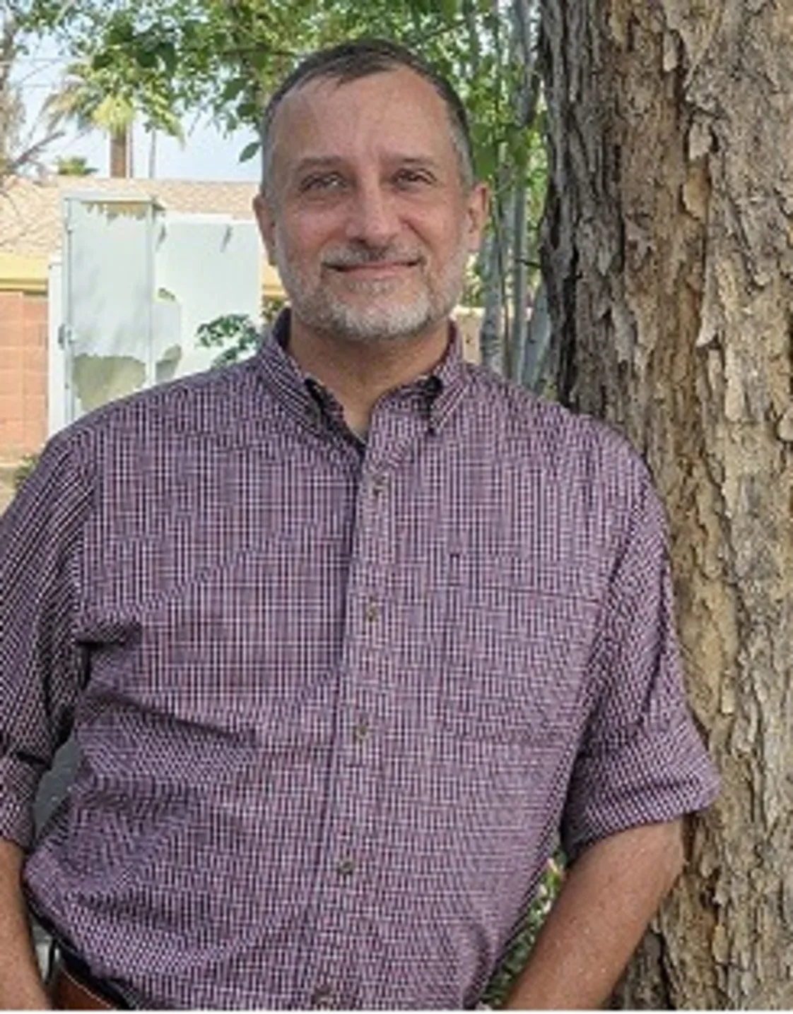 Dr. Bernard Mangone Dr. Bernard Mangone