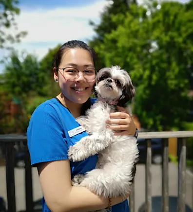 Jenny holding a small dog Jenny holding a small dog