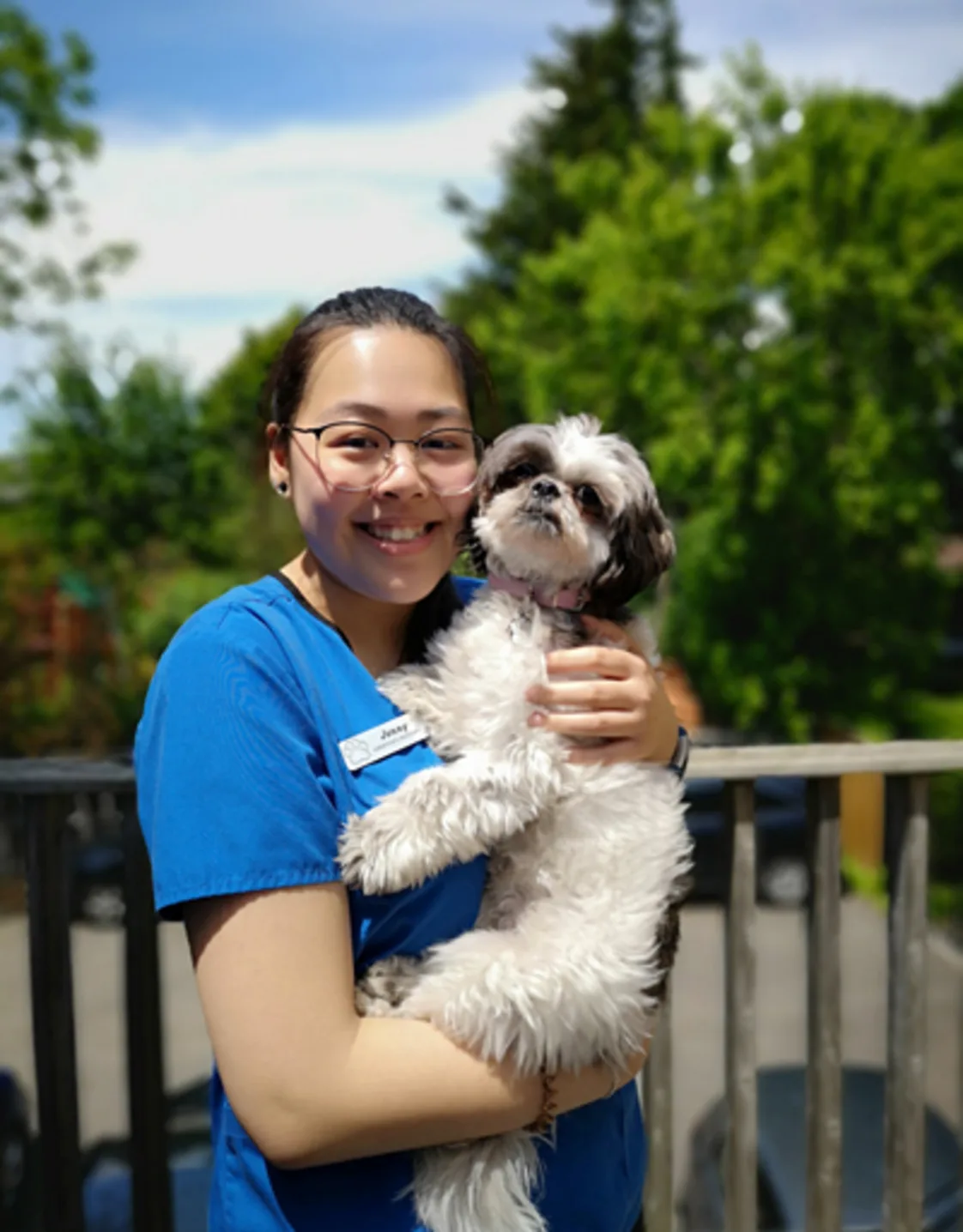 Jenny holding a small dog Jenny holding a small dog