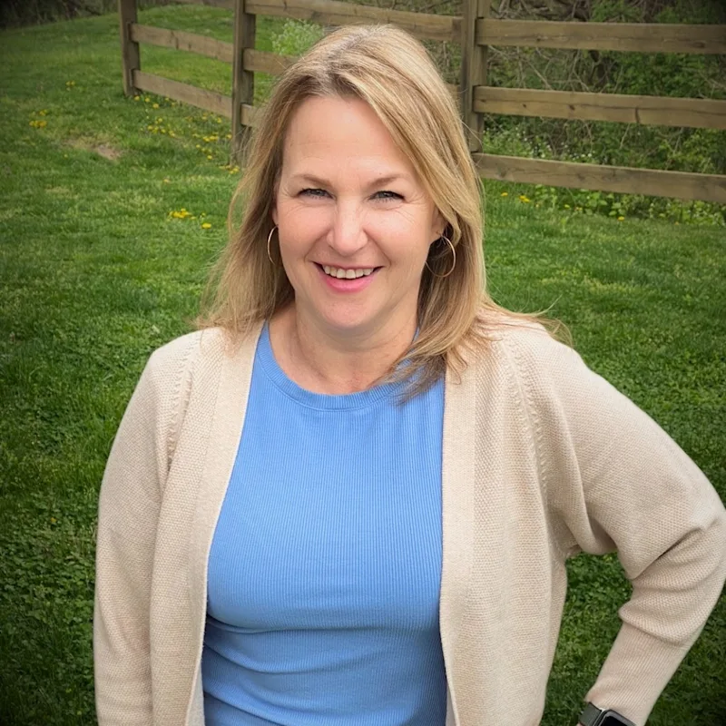 Dr. Harclerode with black dog Dr. Harclerode with black dog