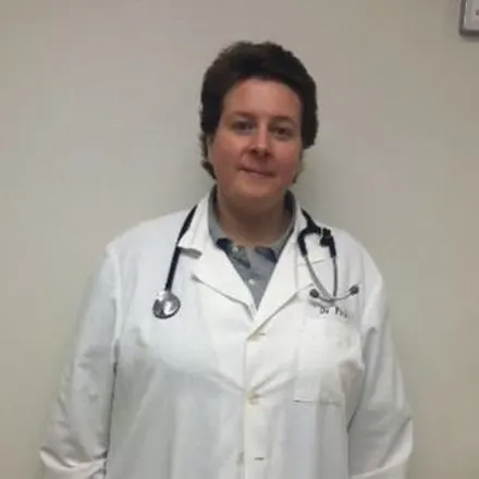 Veterinarian Amy Peck with stethoscope 