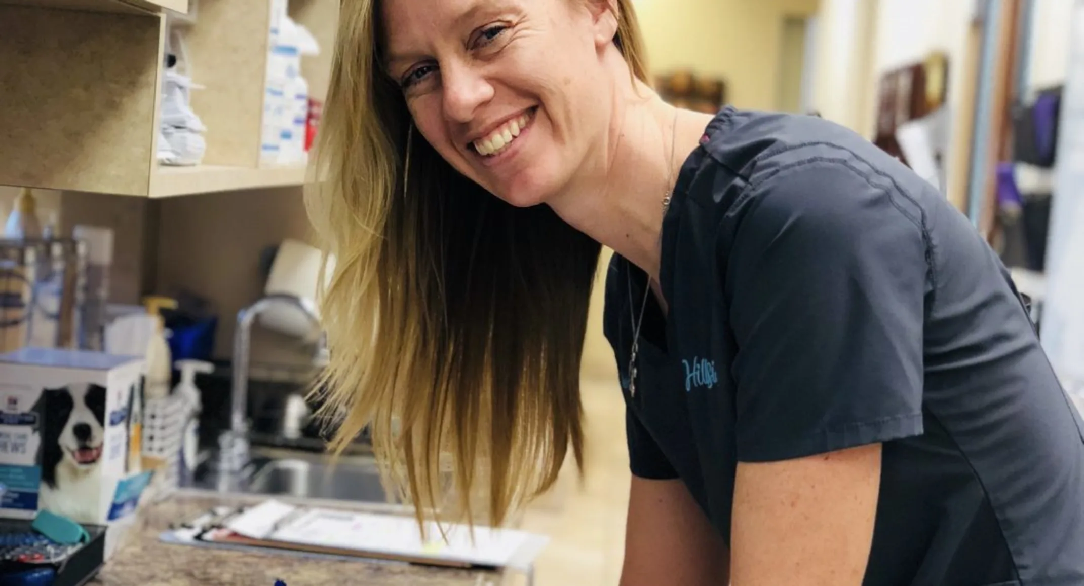 Hillside Animal Hospital's Female Staff Member smiling for the camera in the lab room Hillside Animal Hospital's Female Staff Member smiling for the camera in the lab room