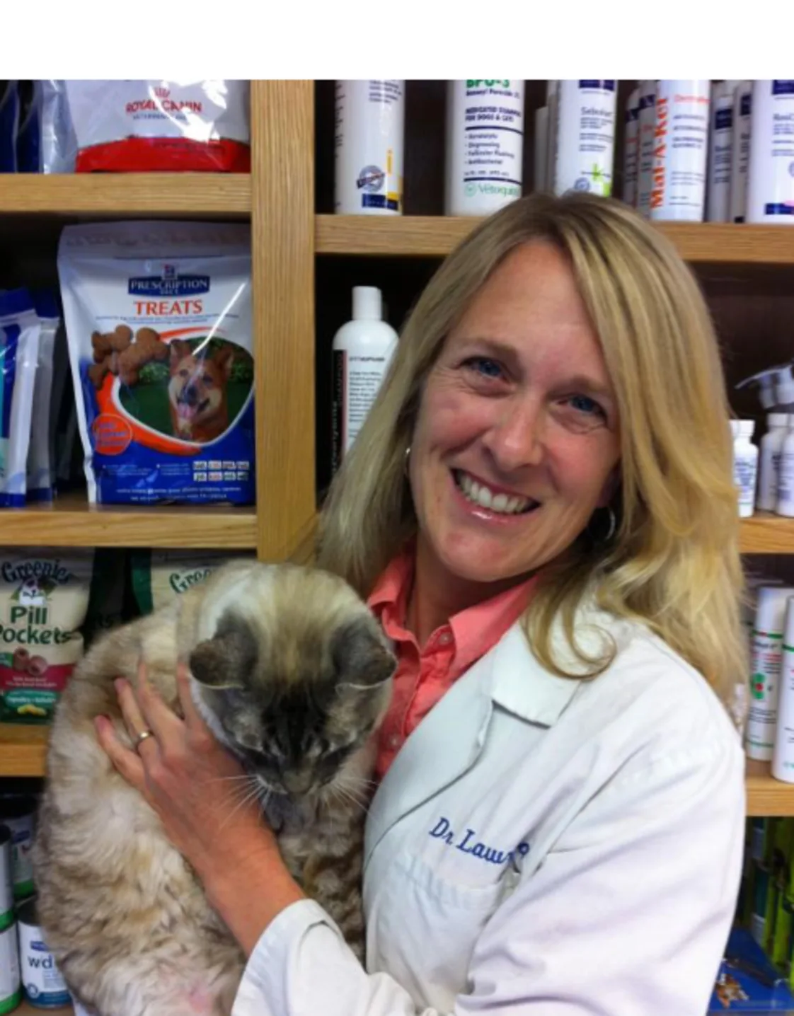 Dr. Jennifer Lawrence holding a cat. Dr. Jennifer Lawrence holding a cat.