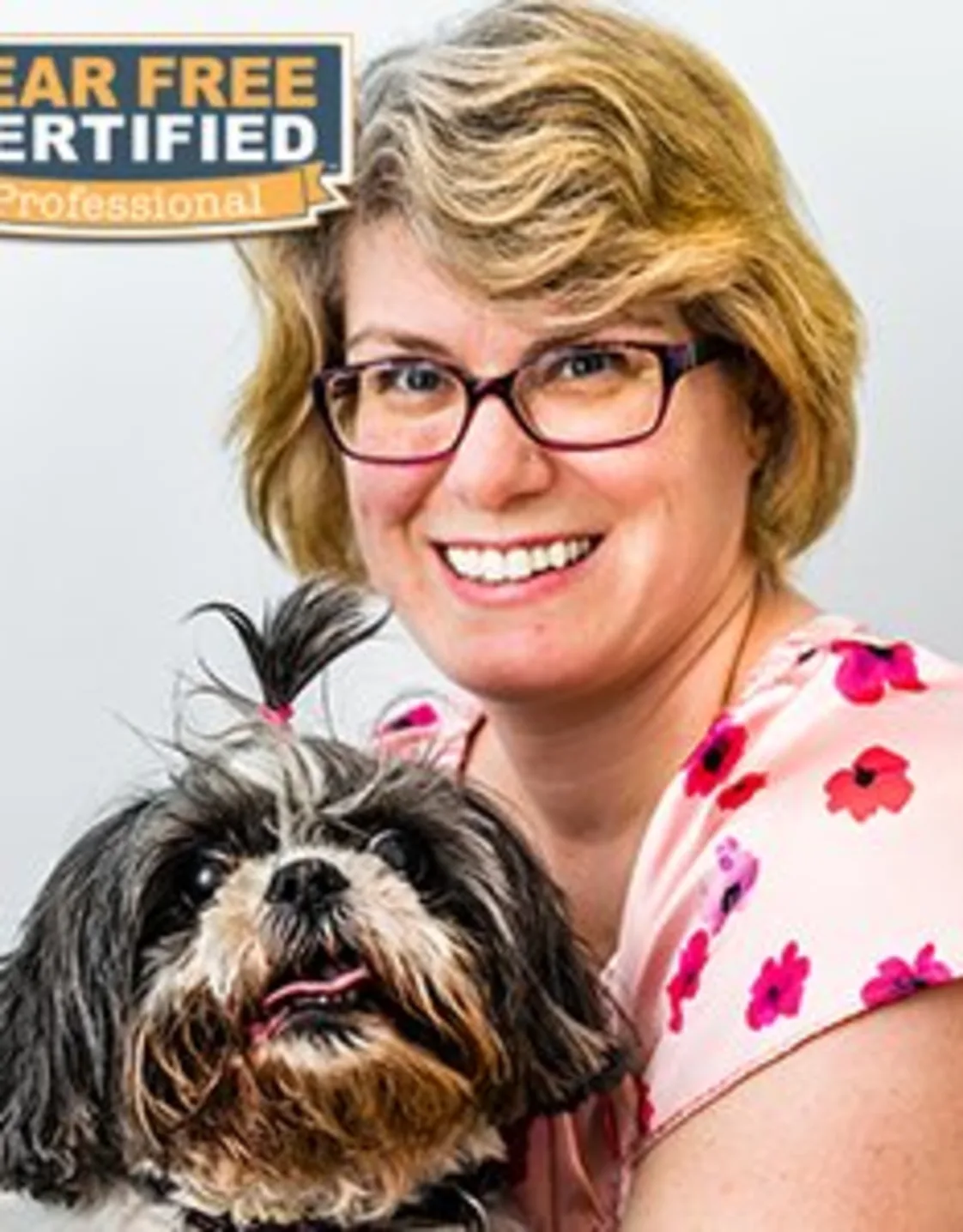 Lisa holding a dog Lisa holding a dog