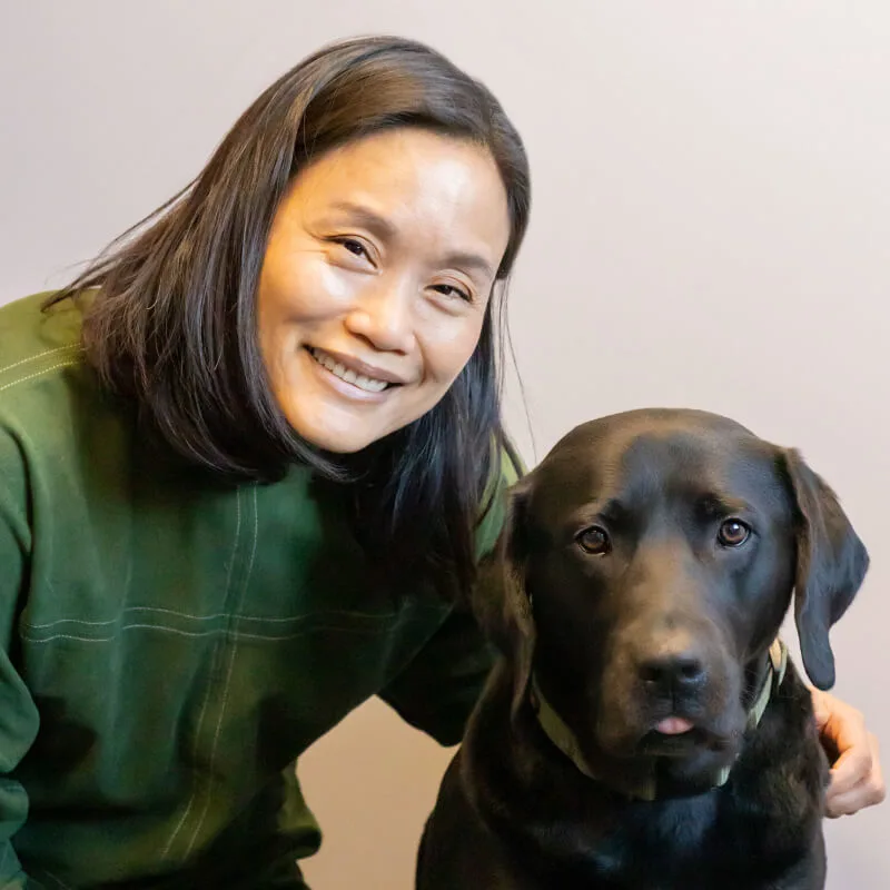 Photo of Sandy Wang w/black dog Photo of Sandy Wang w/black dog