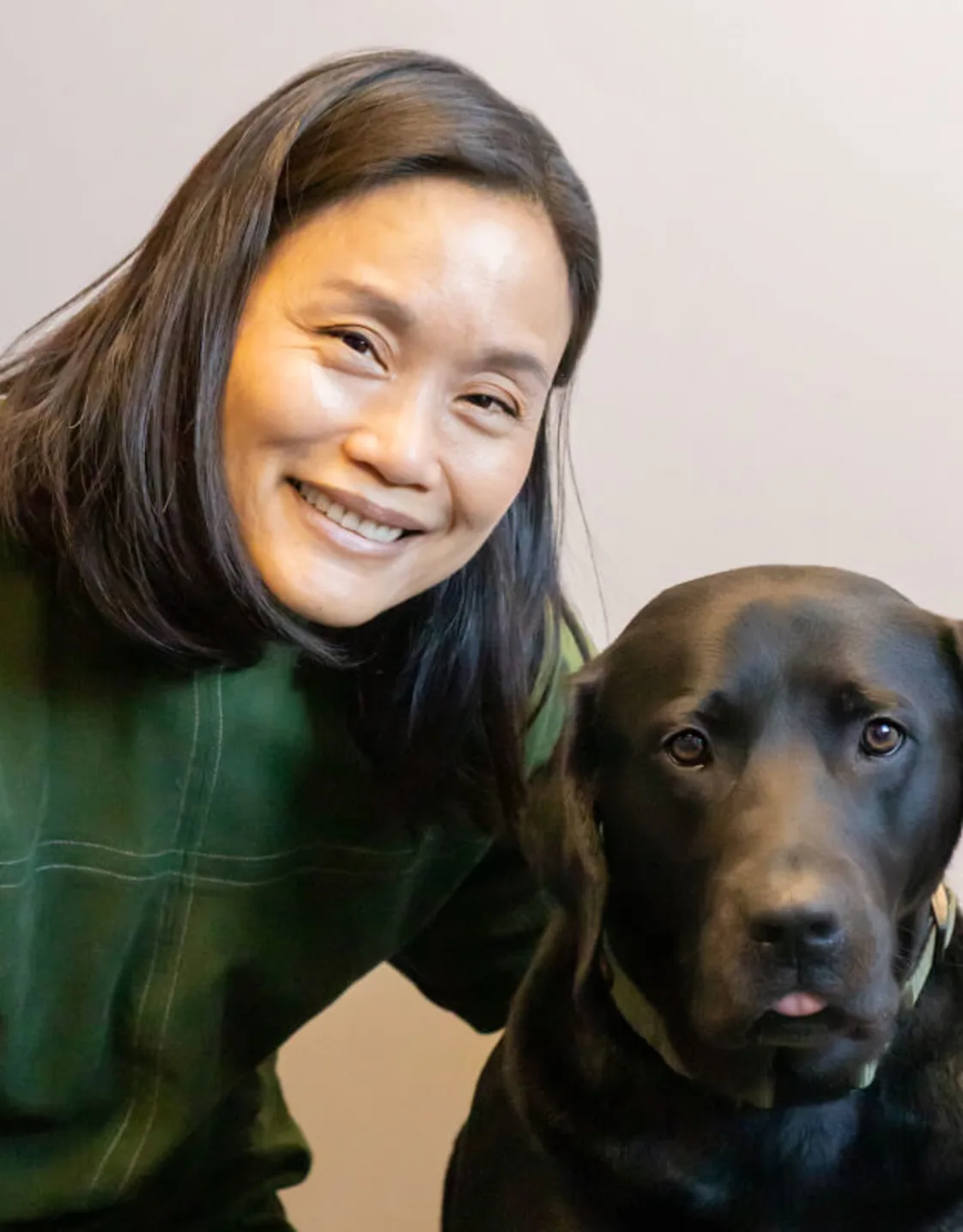 Photo of Sandy Wang w/black dog Photo of Sandy Wang w/black dog