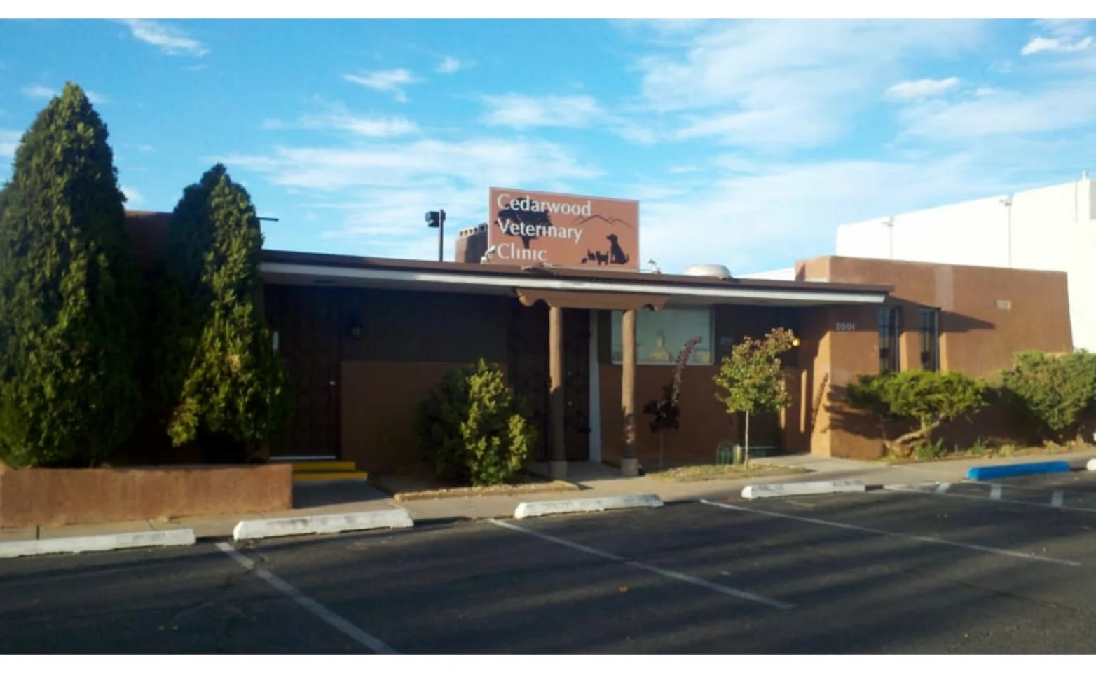 Parking lot and entrance to Cedarwood Veterinary Clinic in Santa Fe, NM