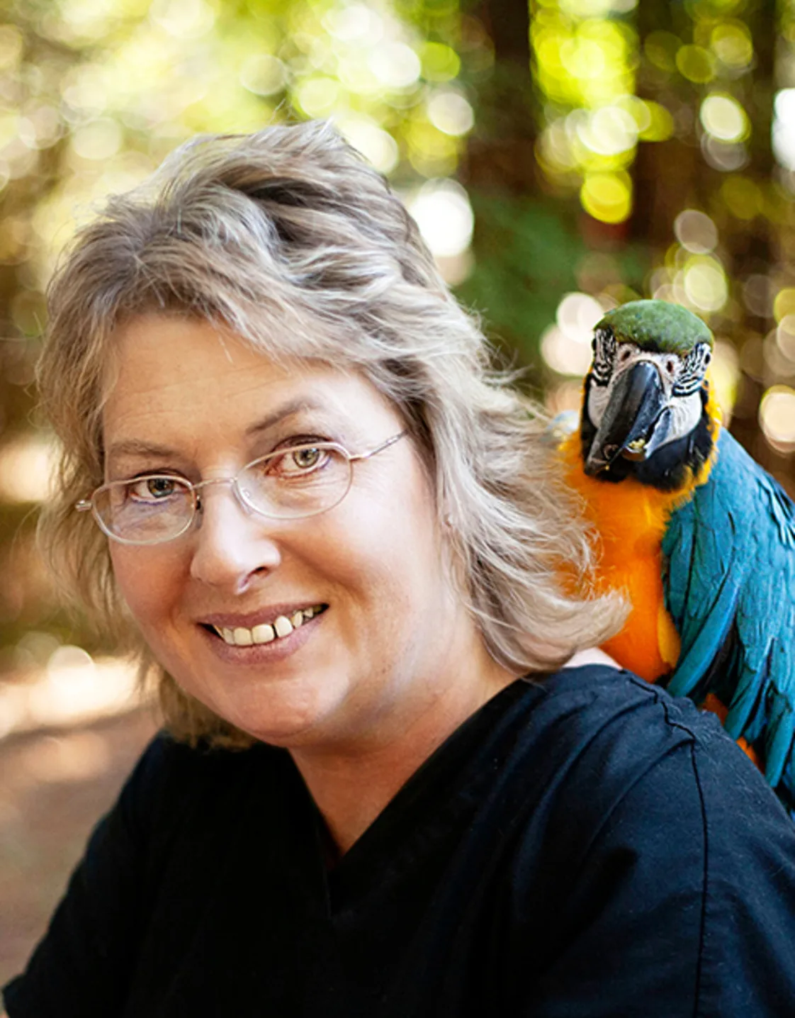 Raegan Cabral with a parrot Raegan Cabral with a parrot