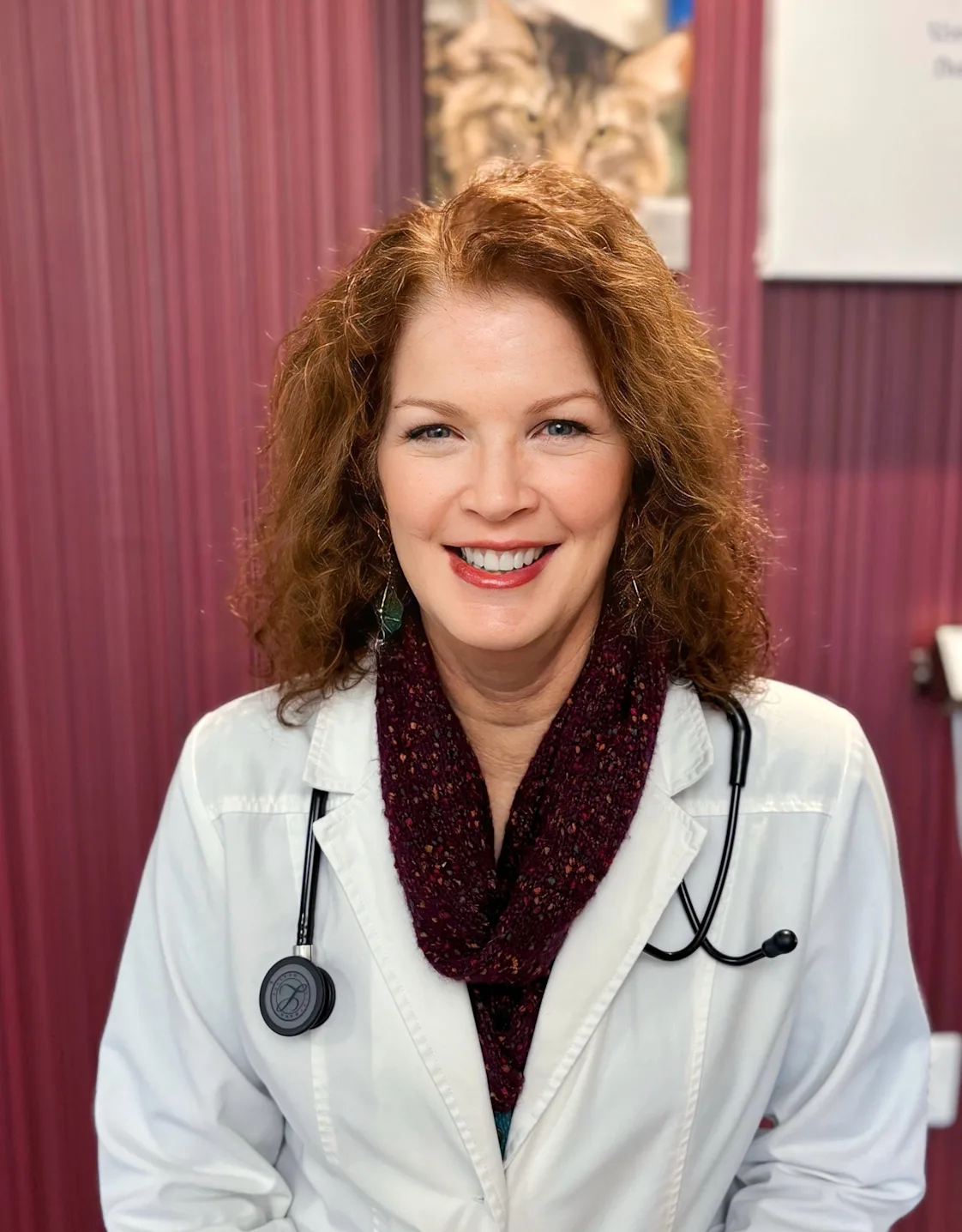 Dr. Weigt smiling in her white coat. Dr. Weigt smiling in her white coat.