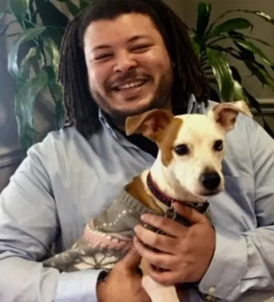 Keith holding a dog Keith holding a dog