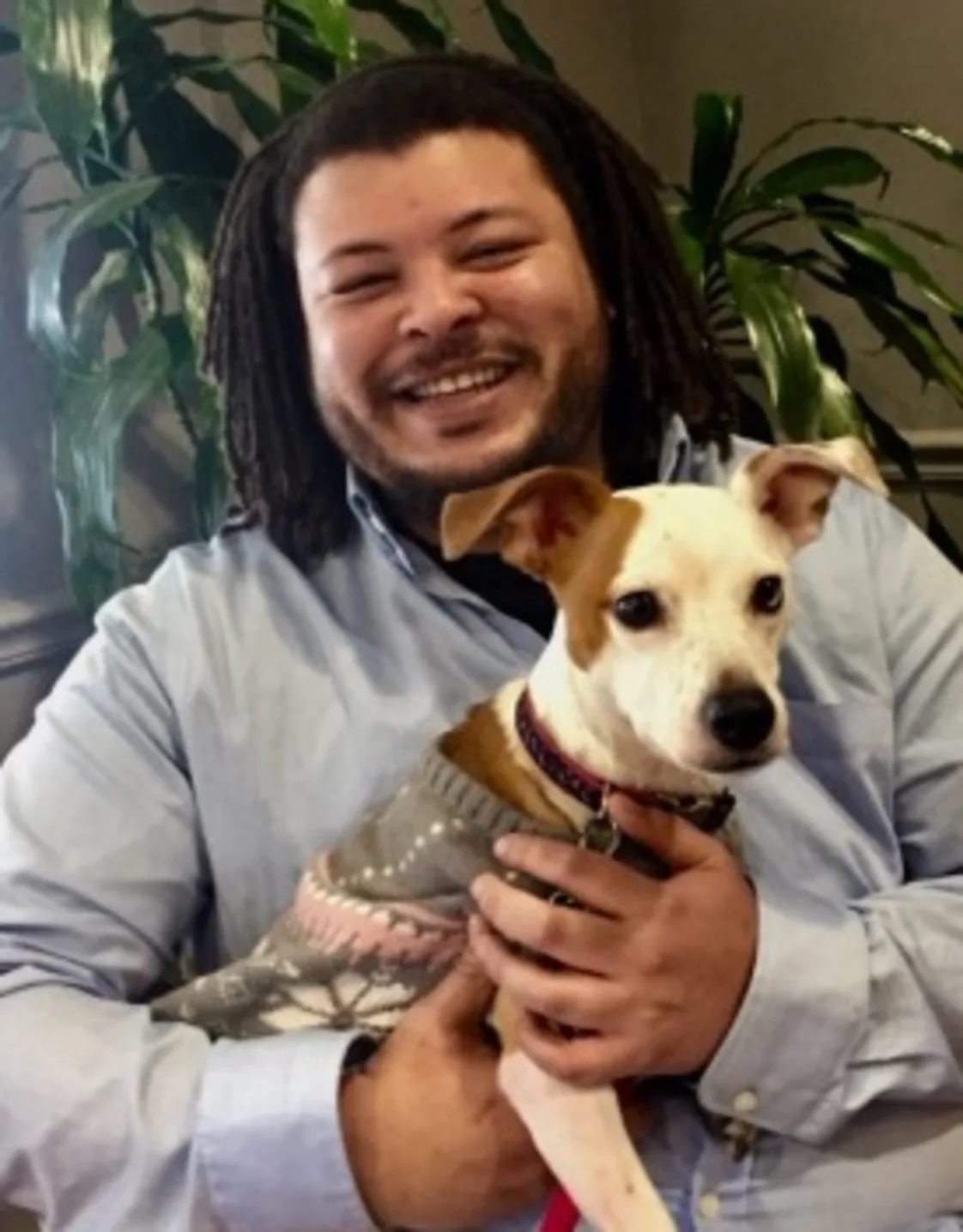Keith holding a dog Keith holding a dog