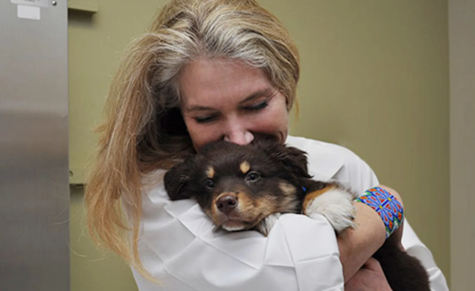 Dr. Ingrid Straeter-Knowlen with puppy patient Dr. Ingrid Straeter-Knowlen with puppy patient